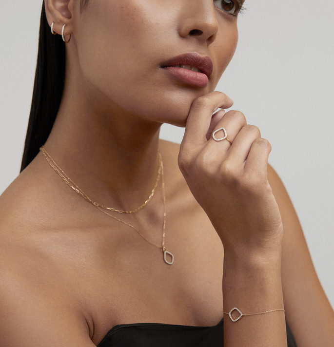 A model wearing new lab grown diamond and solid gold Riva Kite collection