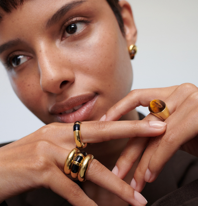 Model wearing Kate Young x Monica Vinader rings